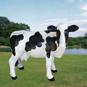 Fiberglass painted cow statues