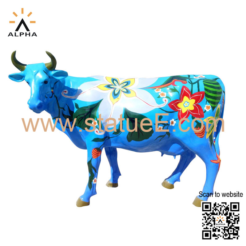 Painted cow statues